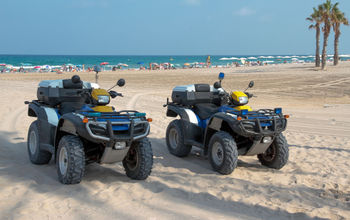 Police, ATVs, quads, vehicles, beach
