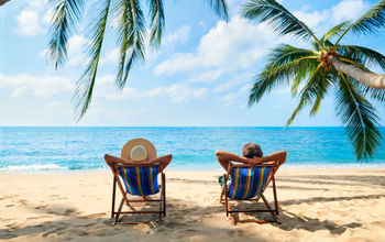 Couple relaxing on an island beach