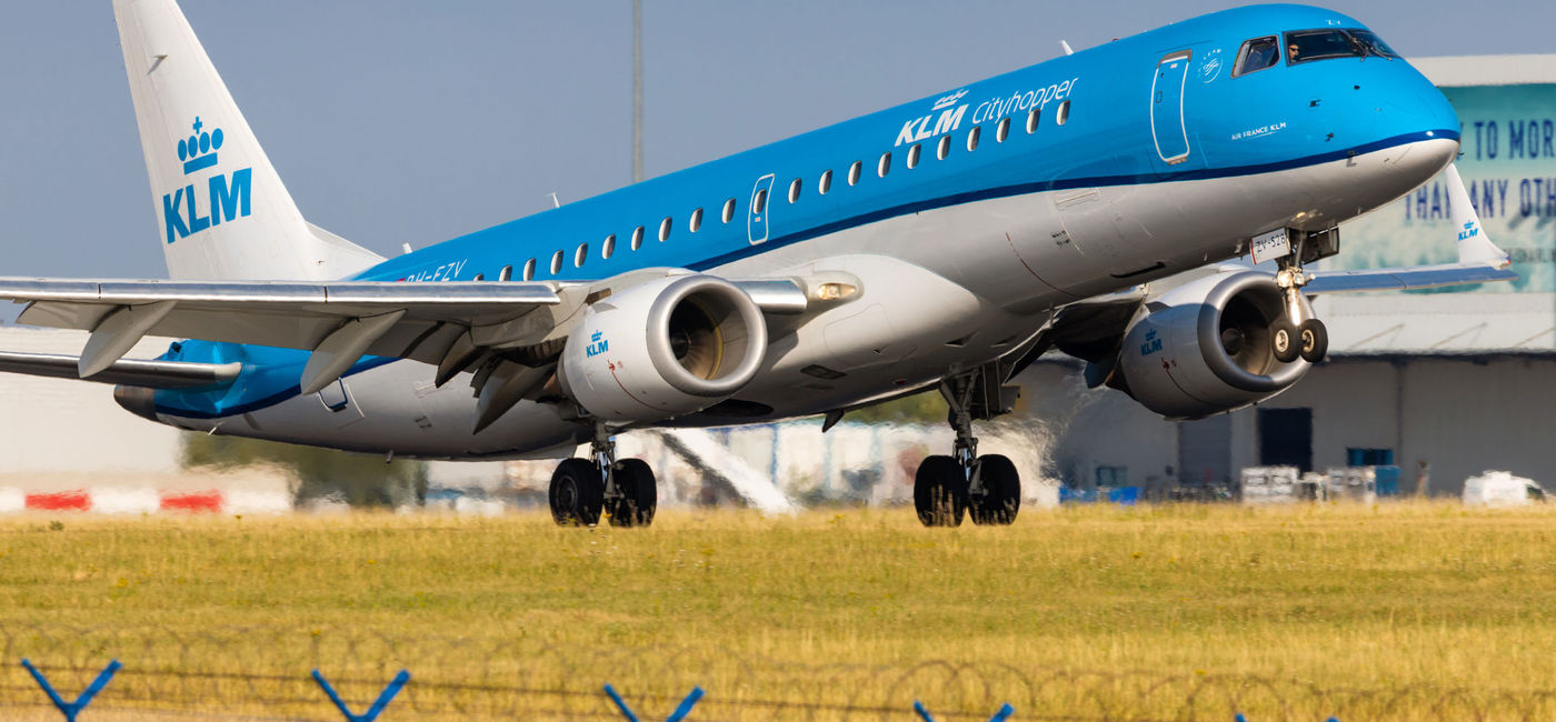 Image: KLM Cityhopper flight landing in Prague, Czech Republic. (photo via rebius/iStock Editorial/Getty Images Plus)