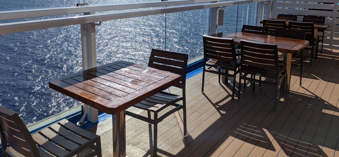 Image: Outdoor dining tables on a cruise ship (photo by Eric Bowman)