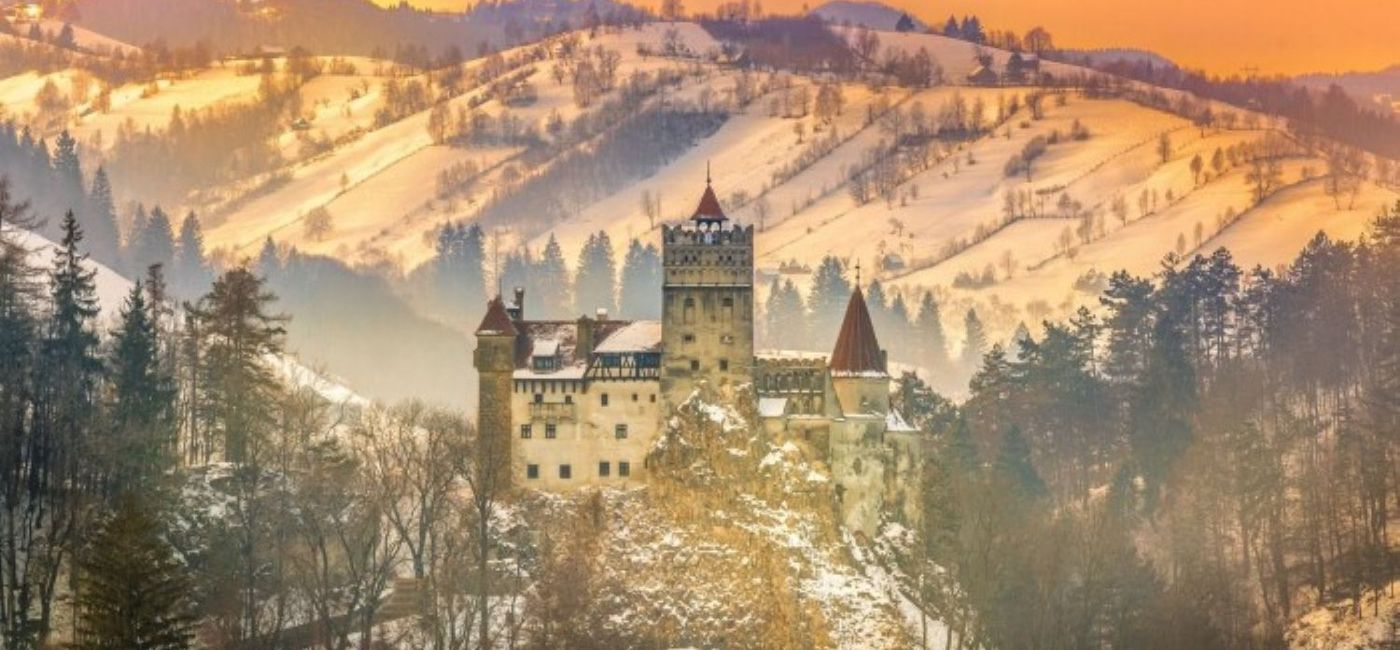 Image: Bran Castle during the winter in Transylvania, Romania. (photo via Viator) ((photo via Viator))