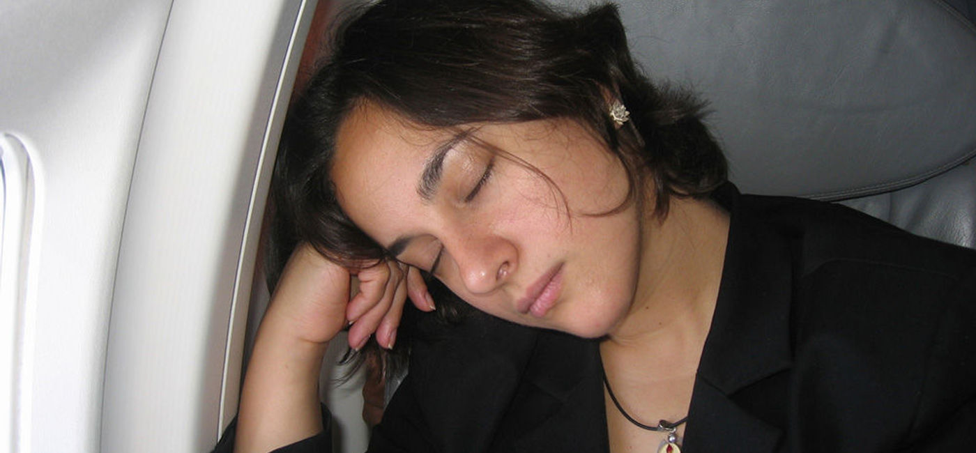 Image: PHOTO: Sleeping on a plane is, in fact, possible. (photo via Flickr/Stereogab)