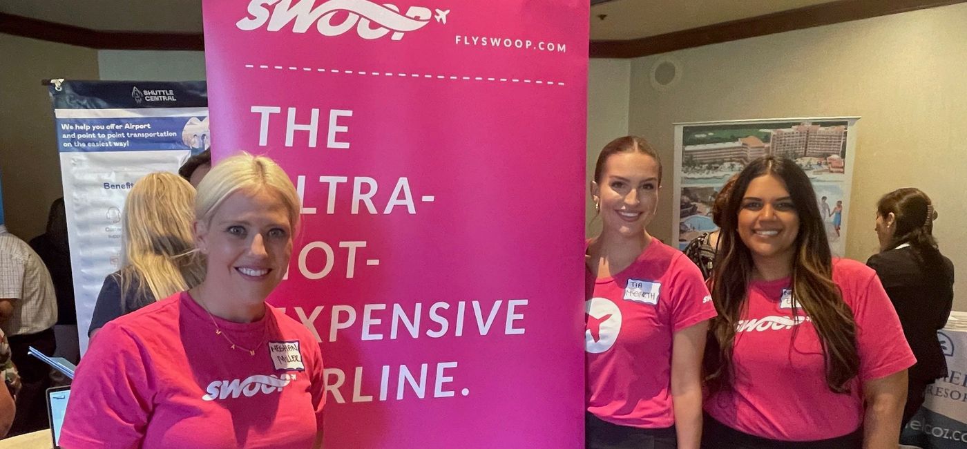 Image: Swoop's Meghan Miller, Tia McGarth and Natasha Elias promote the airline at a Mexican Caribbean event. (Bruce Parkinson)
