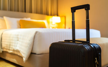 Suitcase delivered to hotel room.