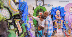 Family Visiting Backstreet Cultural Museum by Justen Williams