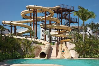 Water slides at Dreams Playa Mujeres Golf & Spa Resort