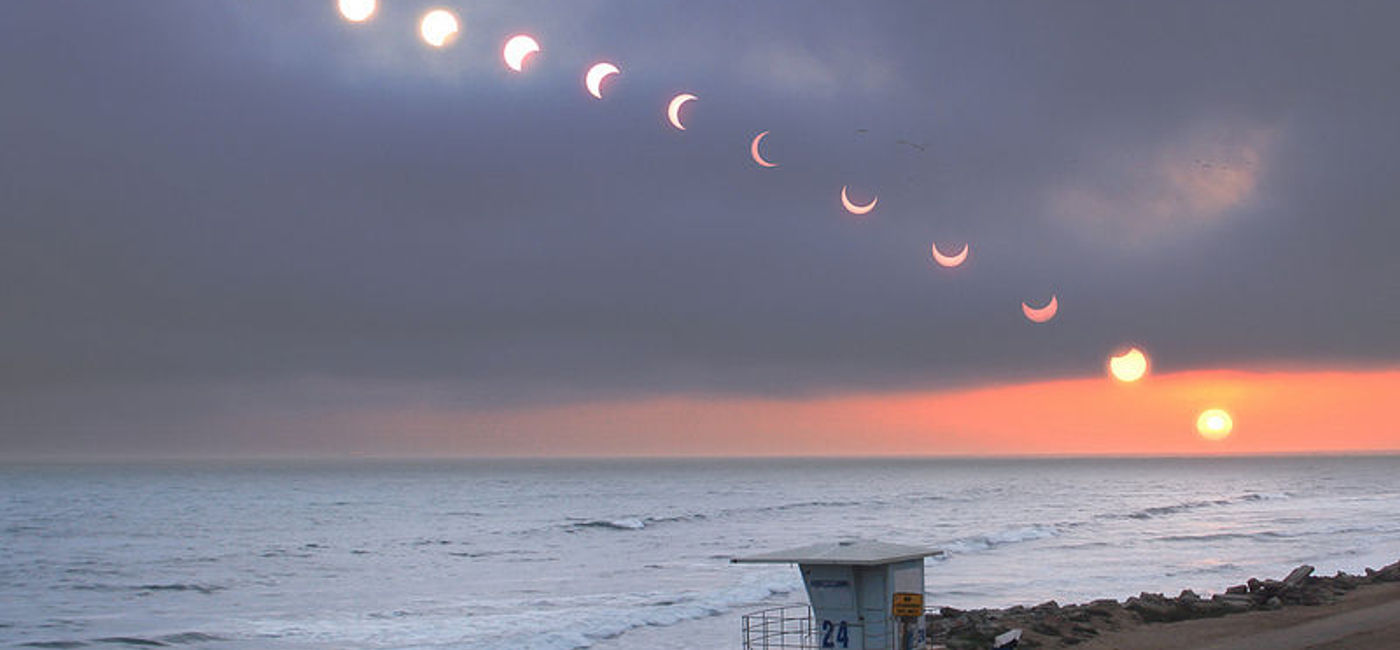 Image: PHOTO: Time-lapse photo of a recent solar eclipse viewed from Huntington Beach, California. (photo via Flickr/jimnista)