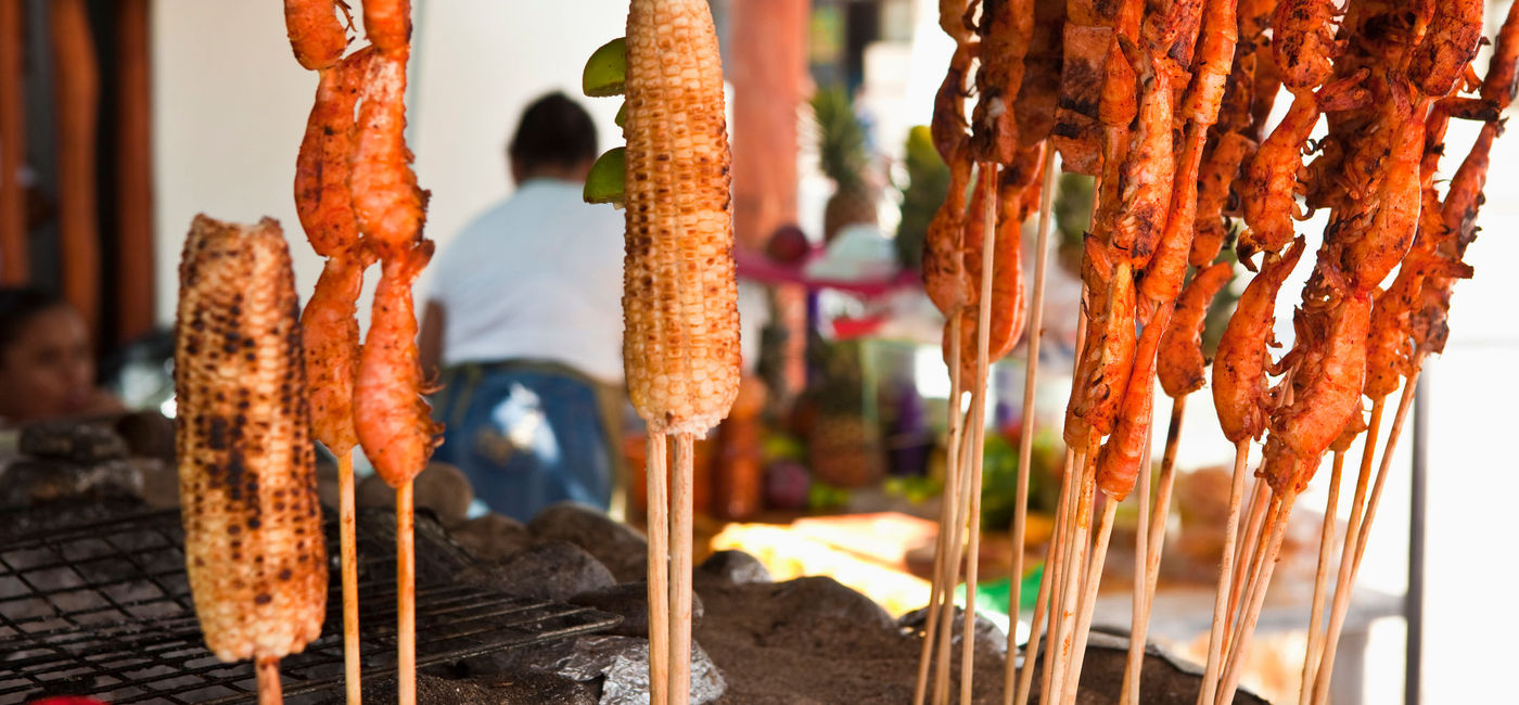 Image: PHOTO: Grilled Shrimp and Corn Kebabs in Puerto Vallarta, Mexico. (photo via LOVE_LIFE/iStock/Getty Images Plus)