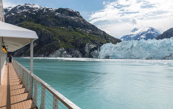 Cruise ship near glacier in Glacier Bay, Alaska.