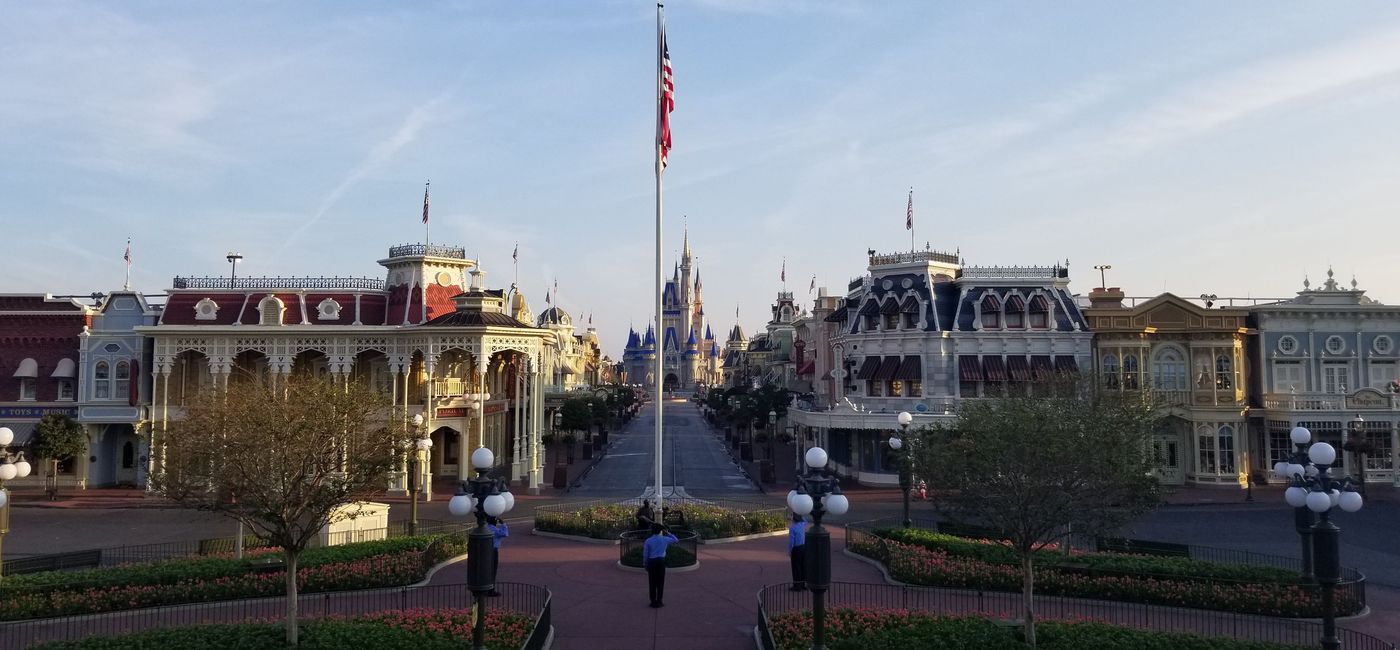 Image: PHOTO: Disney Security team saluting the American flag in Town Square at Magic Kingdom Park. (photo courtesy of Walt Disney World)