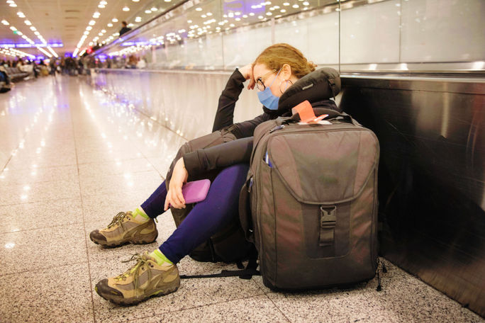 Traveler waiting for delayed flight.