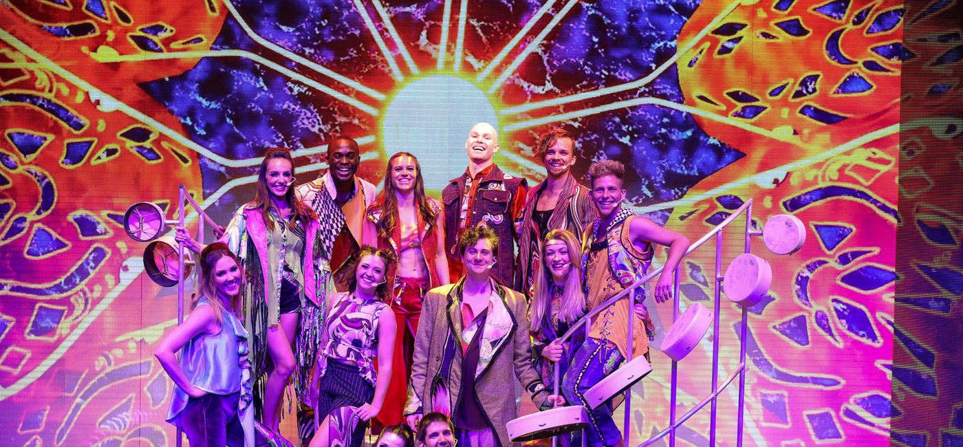 Image: PHOTO: Carnival Panorama's Rock Revolution performers. (photo via Carnival Cruise Line)