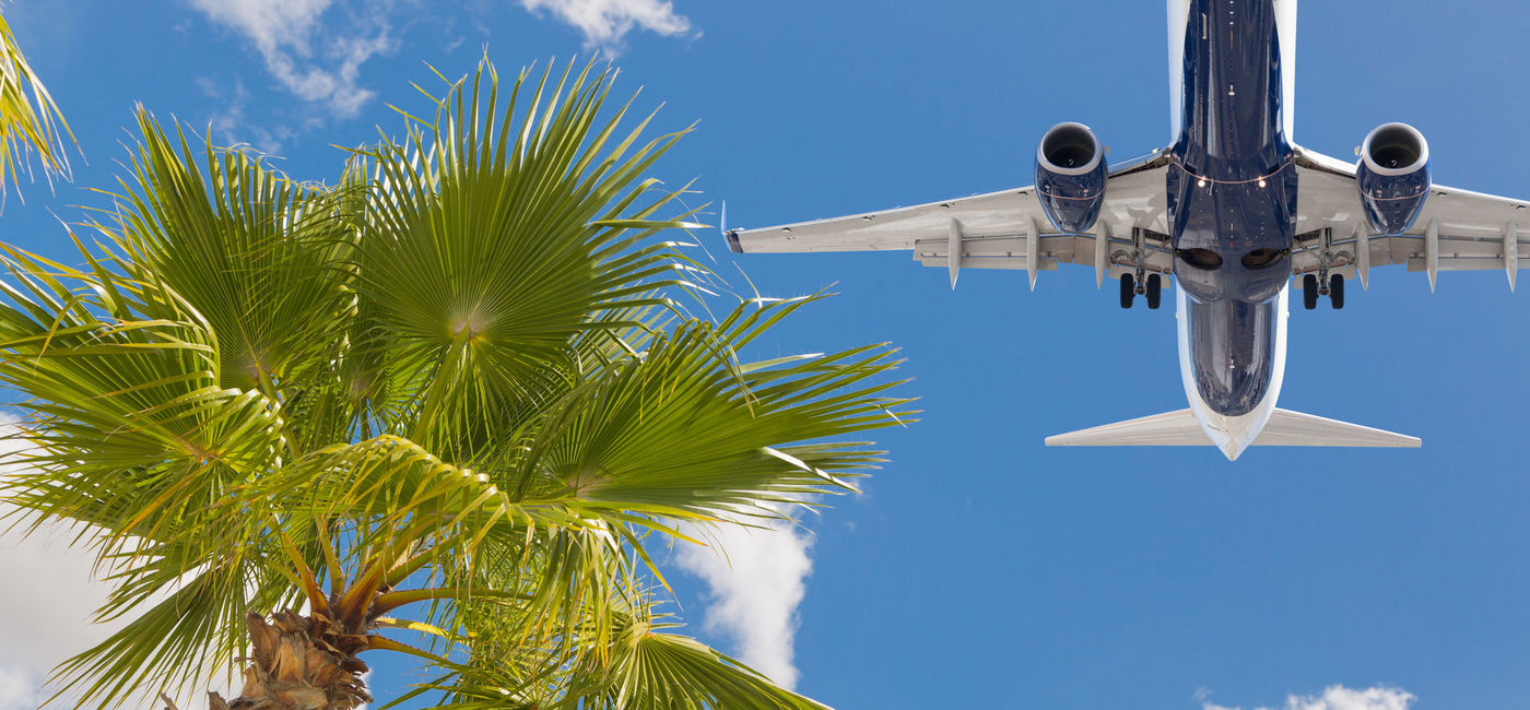 Image: PHOTO: Airplane on arrival over Hawaii. (Photo via iStock/Getty Images Plus/Feverpitched)