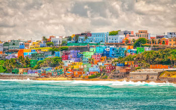 Colorful stacked houses overlooking the sea in Puerto Rico.