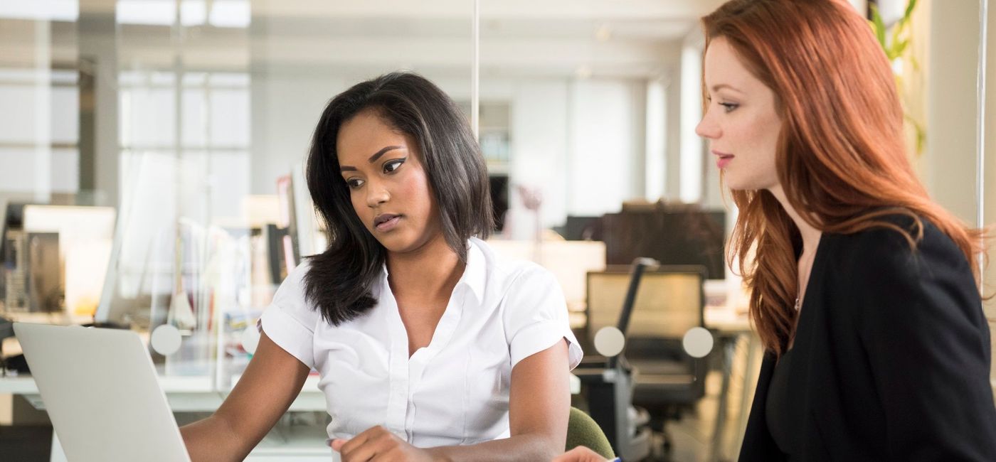 Image: Travel advisor explaining insurance coverage to a client. (photo via JohnnyGreig / getty images) (Getty Images)