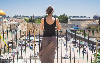 Women looks on at Jerusalem old city, Israel