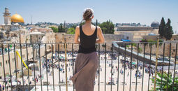 Women looks on at Jerusalem old city, Israel
