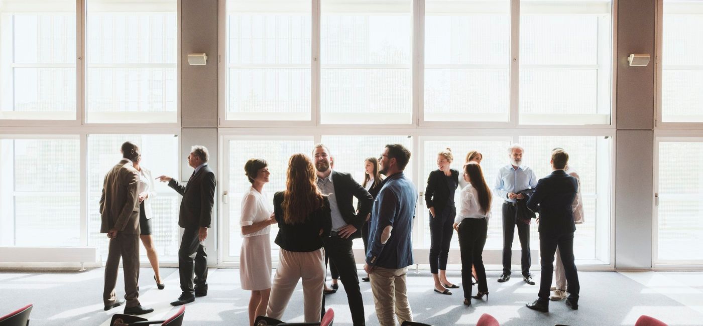 Image: Networking at an event. (photo via gremlin / getty images)