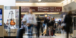 Travelers in the baggage claim area at Nashville International Airport 