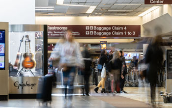 Travelers in the baggage claim area at Nashville International Airport 