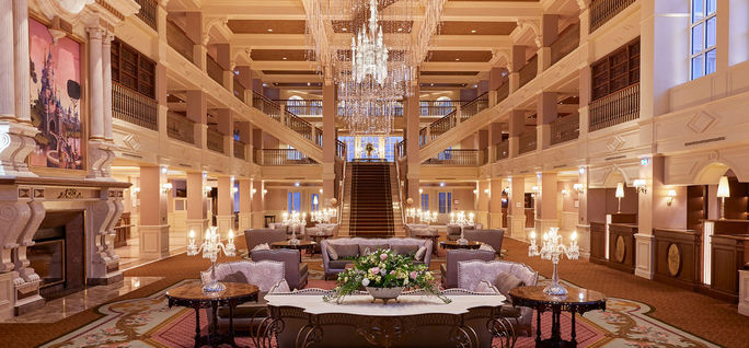 The grand lobby inside the Disneyland Hotel at Disneyland Paris. Disneyland Paris, Disneyland Hotel, hotels in Disneyland Paris, luxury disney hotels