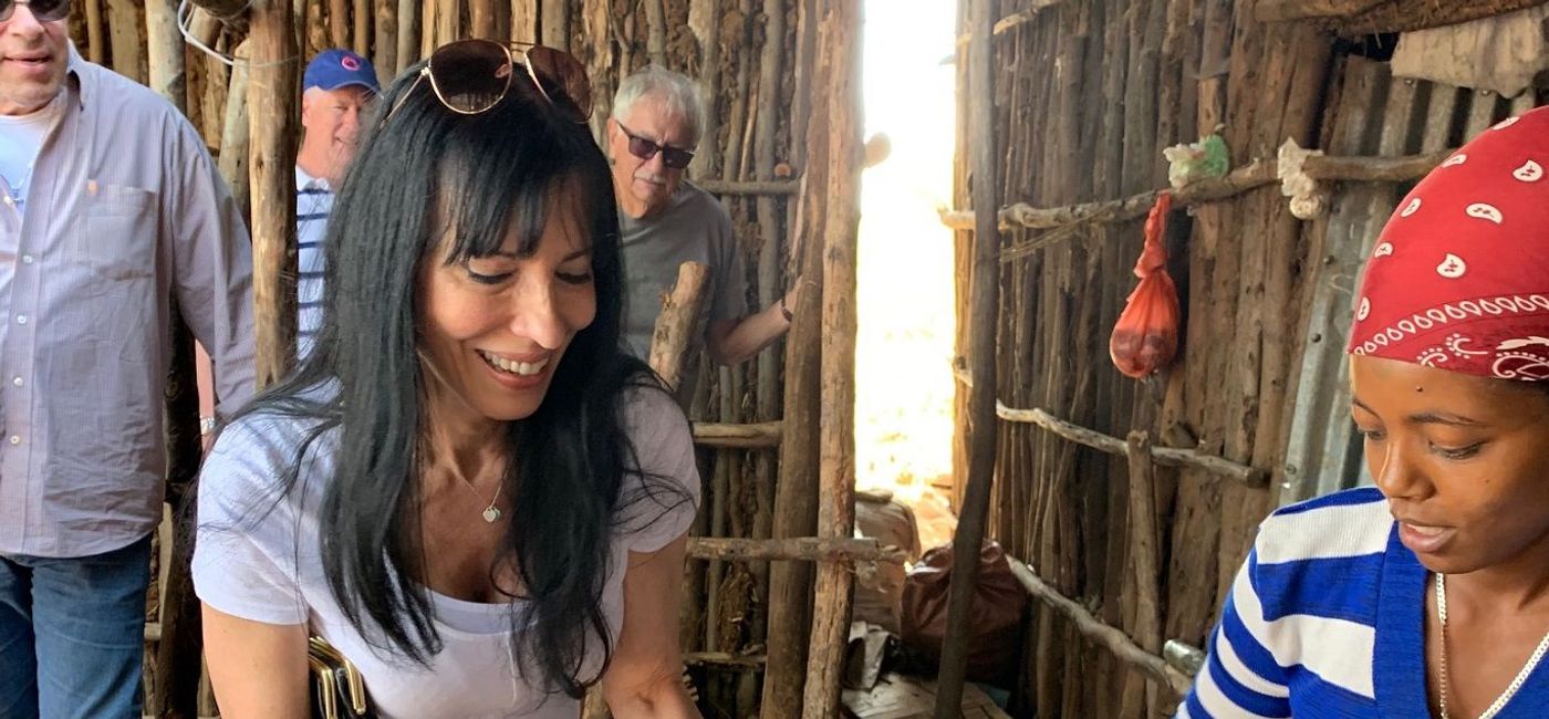 Image: PHOTO: Carol Dimopoulos preparing injera bread in Ethiopia. (photo via Perillo's Learning Journeys) (Perillo's Learning Journeys)