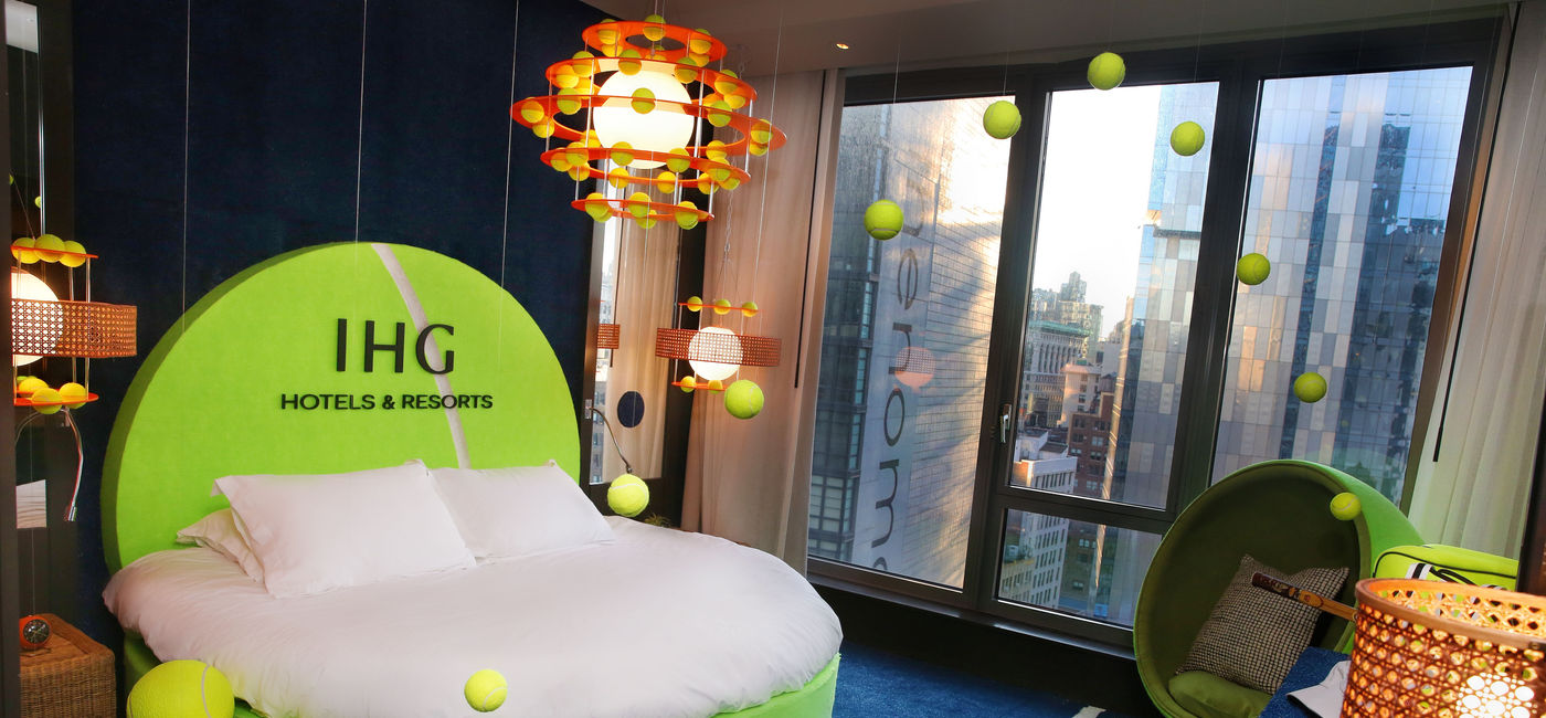 Image: The IHG Racquet Room, a tennis-themed room at the Kimpton Hotel Eventi. (photo via IHG Hotels & Resorts) ((photo via IHG Hotels & Resorts))
