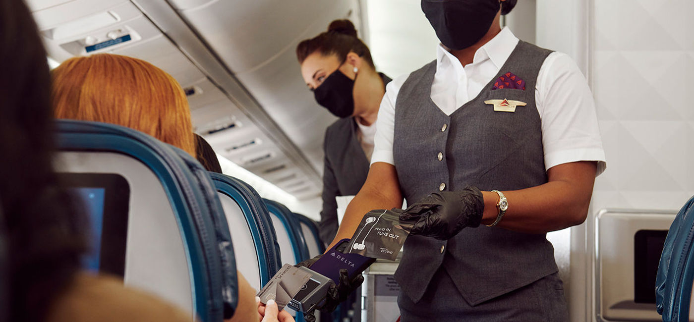 Image: Delta Air Lines' contactless onboard payment. (photo via Delta Air Lines Media)