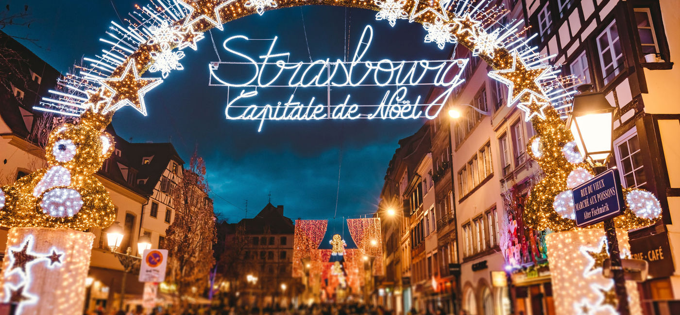 Image: PHOTO: Entrance to the main shopping lane in Strasbourg's Christmas Market in Alsace, France. (Photo via iStock / Getty Images Plus / serts)