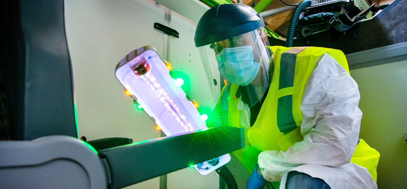 Image: PHOTO: The UV wand can disinfect high touch surfaces. (photo by Marian Lockhart/Boeing)