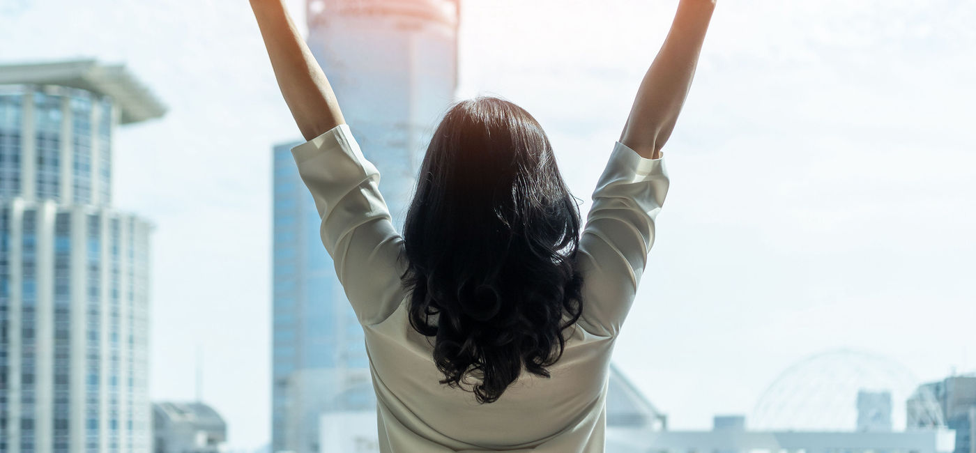 Image: A female business leader celebrating her success. (photo via iStock/Getty Images Plus/Chinnapong)