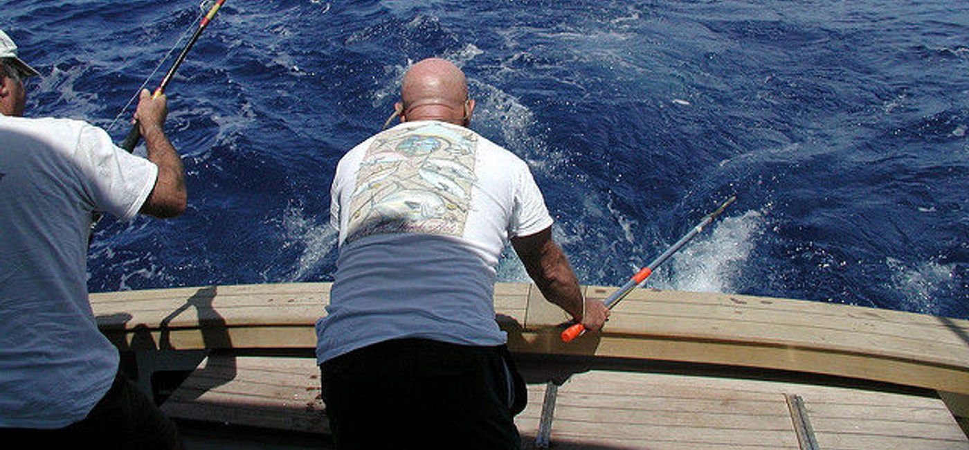Image: PHOTO: Men fishing in The Bahamas (Photo via Flickr/Kim)