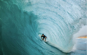 El Salvador's beaches are known worldwide for their attractive surfing waves. (Photo via Daniel_Goldin/iStock/Getty Images Plus).