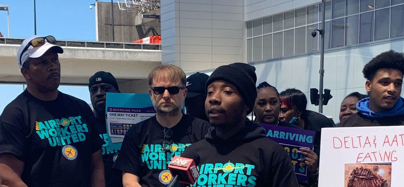 Image: Workers hold rally at ATL Airport  (Photo Credit: Service Employees International Union)