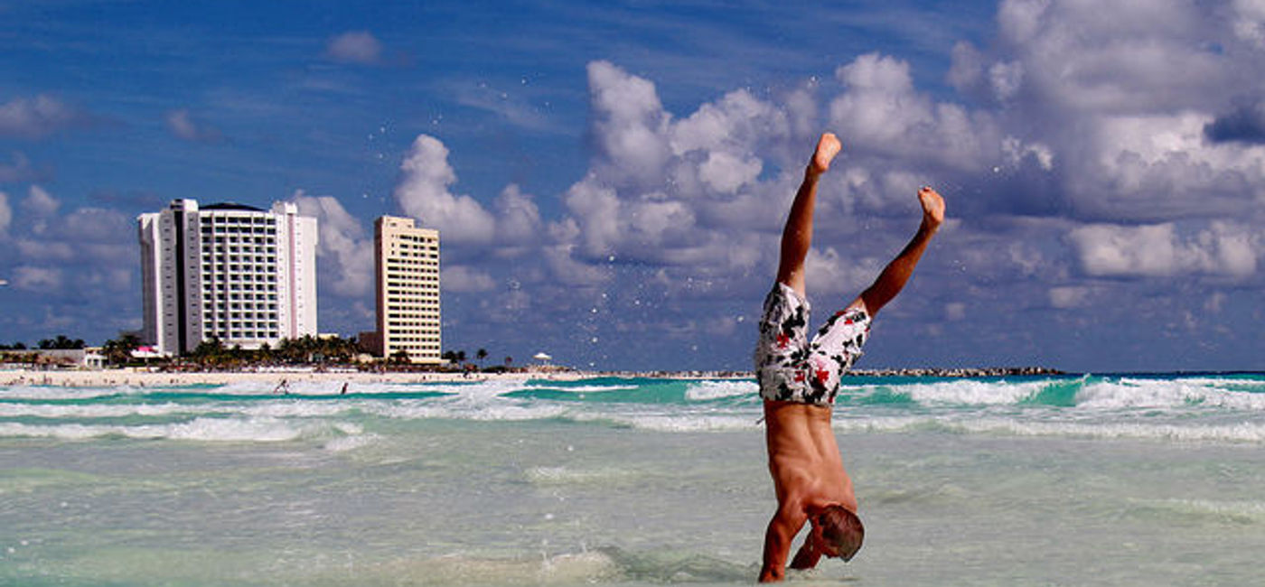 Image: PHOTO: Backflipping for joy over the beauty of Cancun. (photo via Flickr/Predi)
