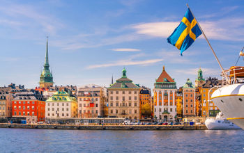 Old Town, waterfront, docks, Stockholm, Sweden, flag