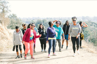 Black women traveling, hiking