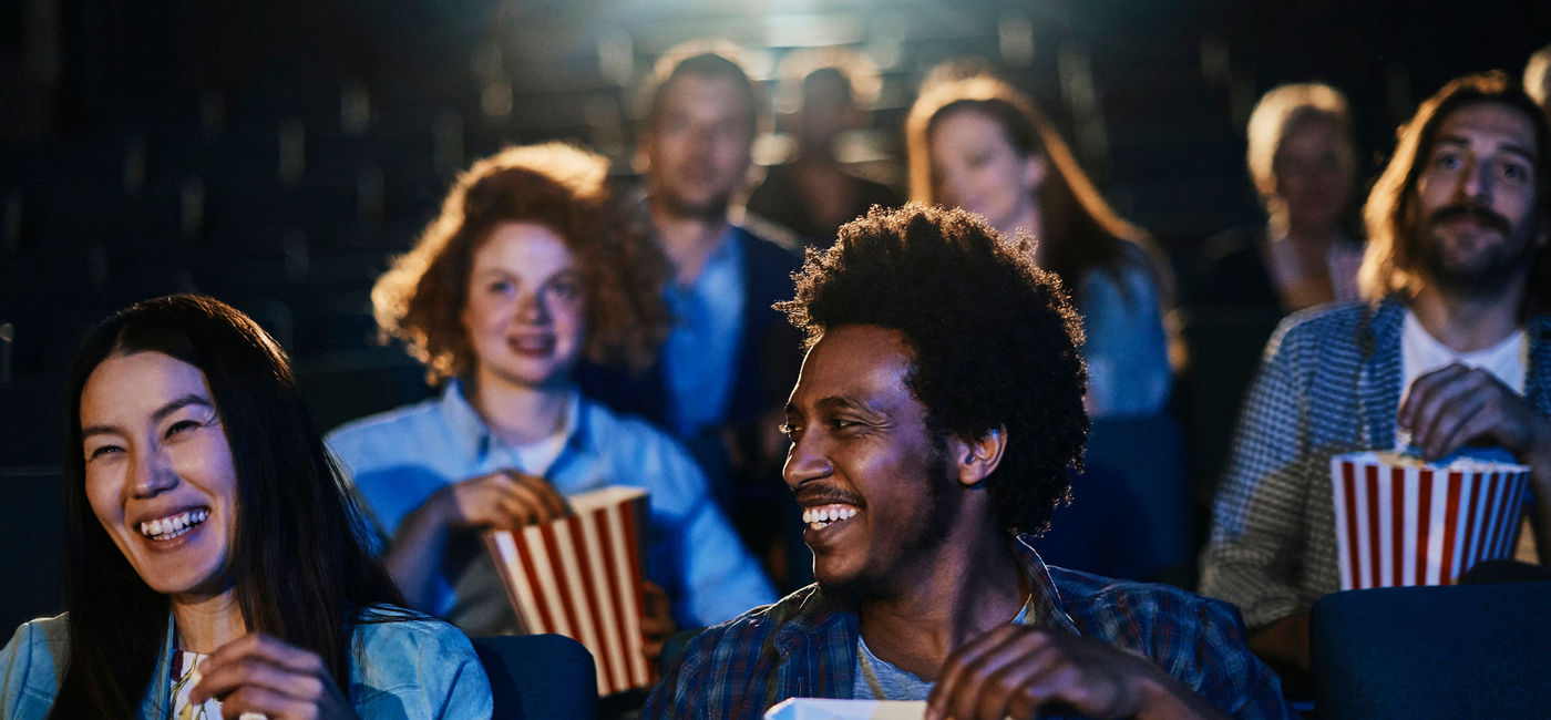 Image: People watching a movie at the cinema theater. (photo via iStock/Getty Images E+/Geber86)