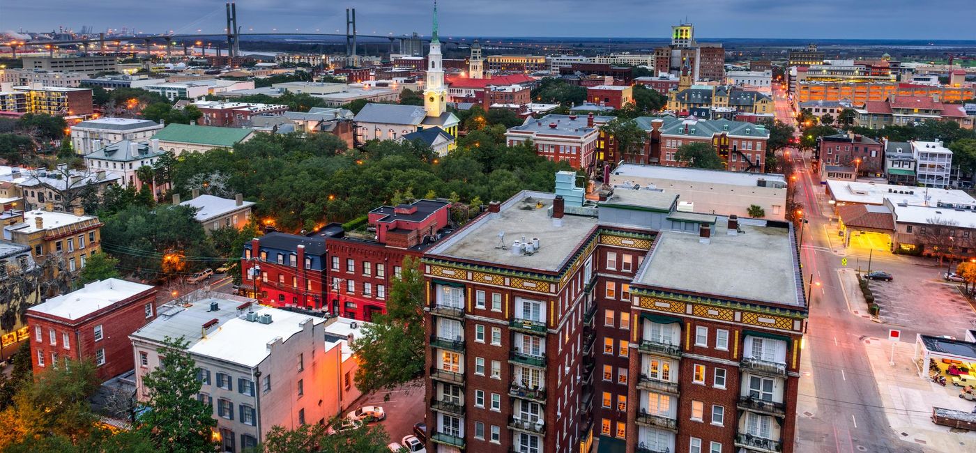 Image: PHOTO: Downtown Savannah, Georgia at dusk. (photo via SeanPavonePhoto/iStock/Getty Images Plus)