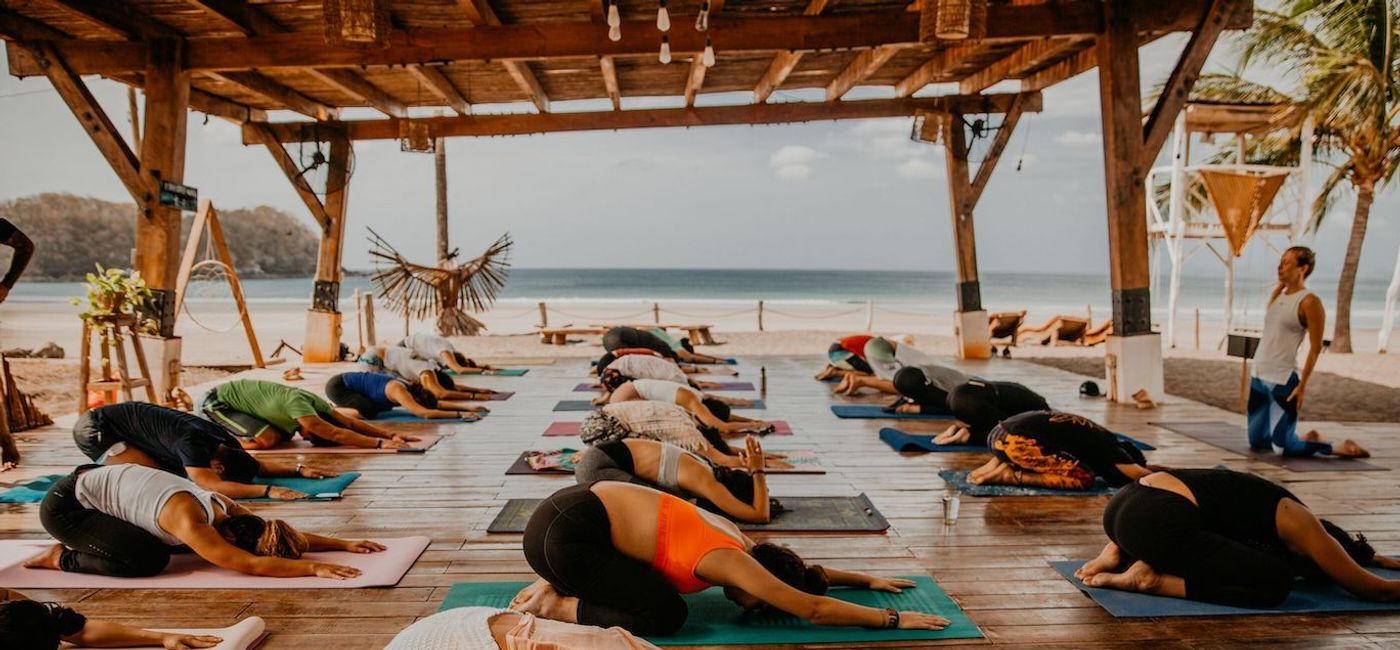 Image: A yoga class at Selina Playa Venao in Panama. (photo via @Leyghphoto) (travAlliancemedia, LLC - Media License)