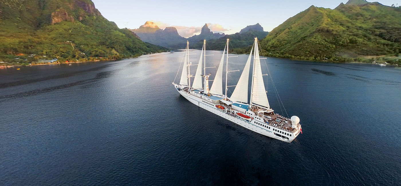 Image: Windstar's Wind Spirit in Tahiti (photo via Windstar Cruises) (Windstar Cruises Media License)