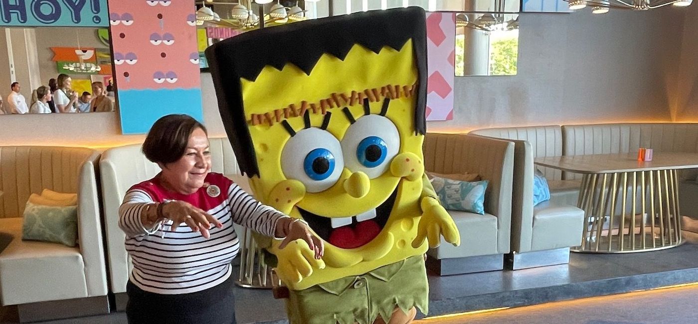 Image: Fun for all ages: Karisma Hotels & Resorts executive Dolores Lopez Lira has some fun with SpongeBob. (Bruce Parkinson)