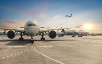 Passenger airplane sitting on the tarmac.