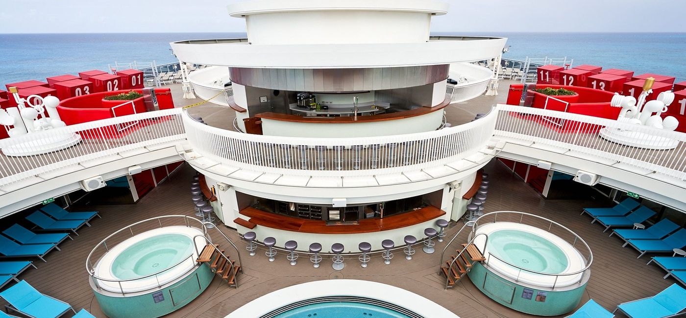 Image: Outdoor pool area. (photo via Virgin Voyages)