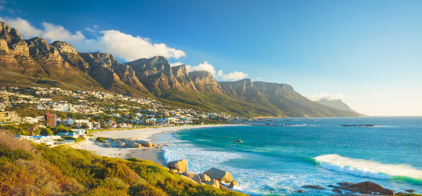 Image: PHOTO: Twelve Apostles mountain in Camps Bay, Cape Town, South Africa. (photo via spooh / Getty Images / E+)