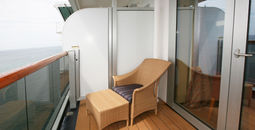 Single chair on solo stateroom balcony.