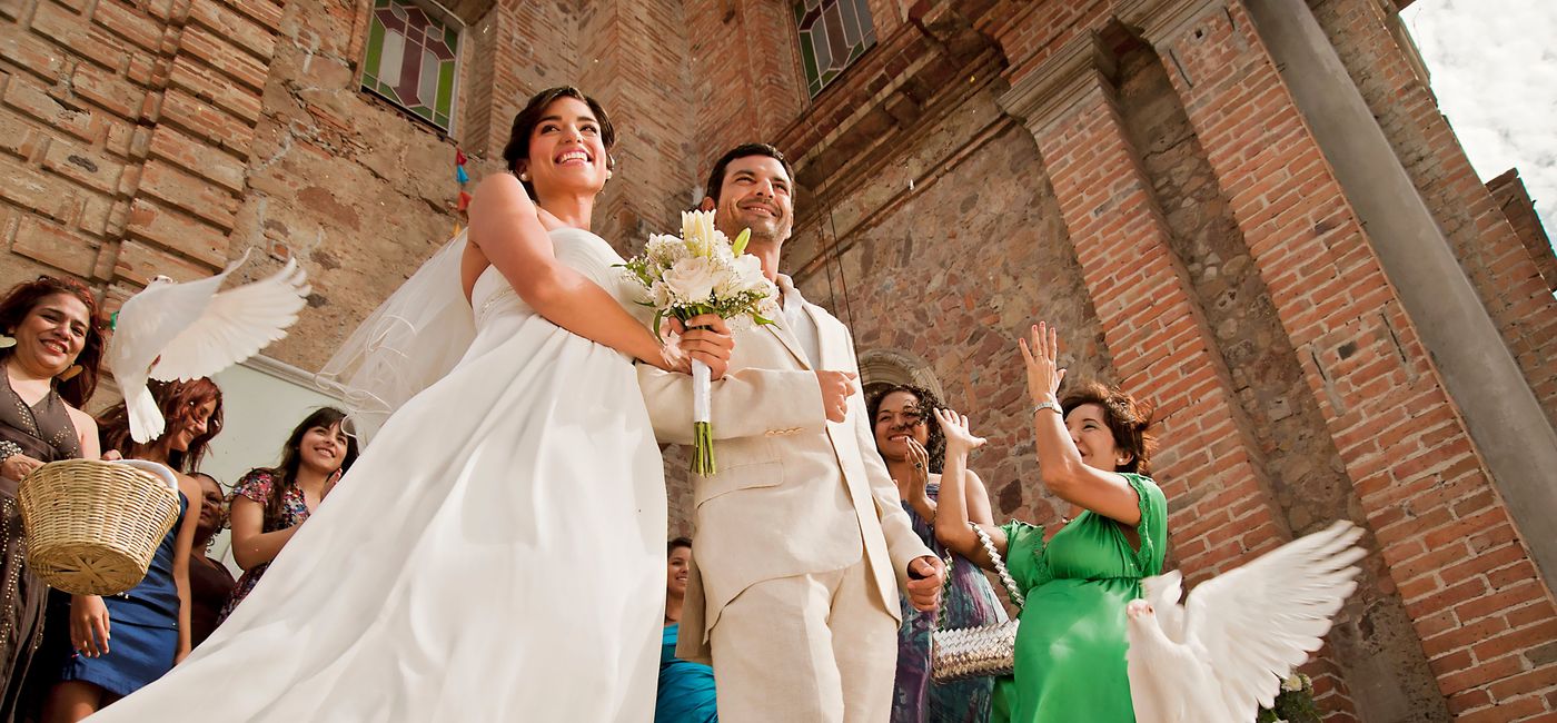 Image: Newlyweds exit the Iglesia de Nuestra Senora de Guadalupe in Puerto Vallarta. (photo via Puerto Vallarta Tourism Board) ((photo via Puerto Vallarta Tourism Board))