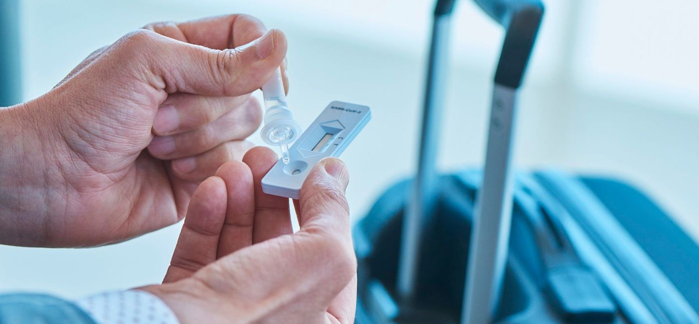 Image: Traveler with a COVID-19 rapid test at the airport. (photo via nito100 / iStock / Getty Images Plus) (nito100 /  iStock / Getty Images Plus)