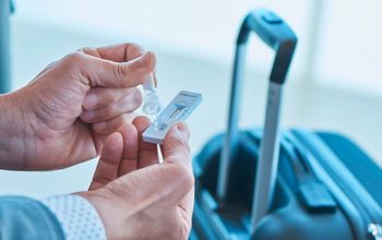 Traveler with a COVID-19 rapid test at the airport