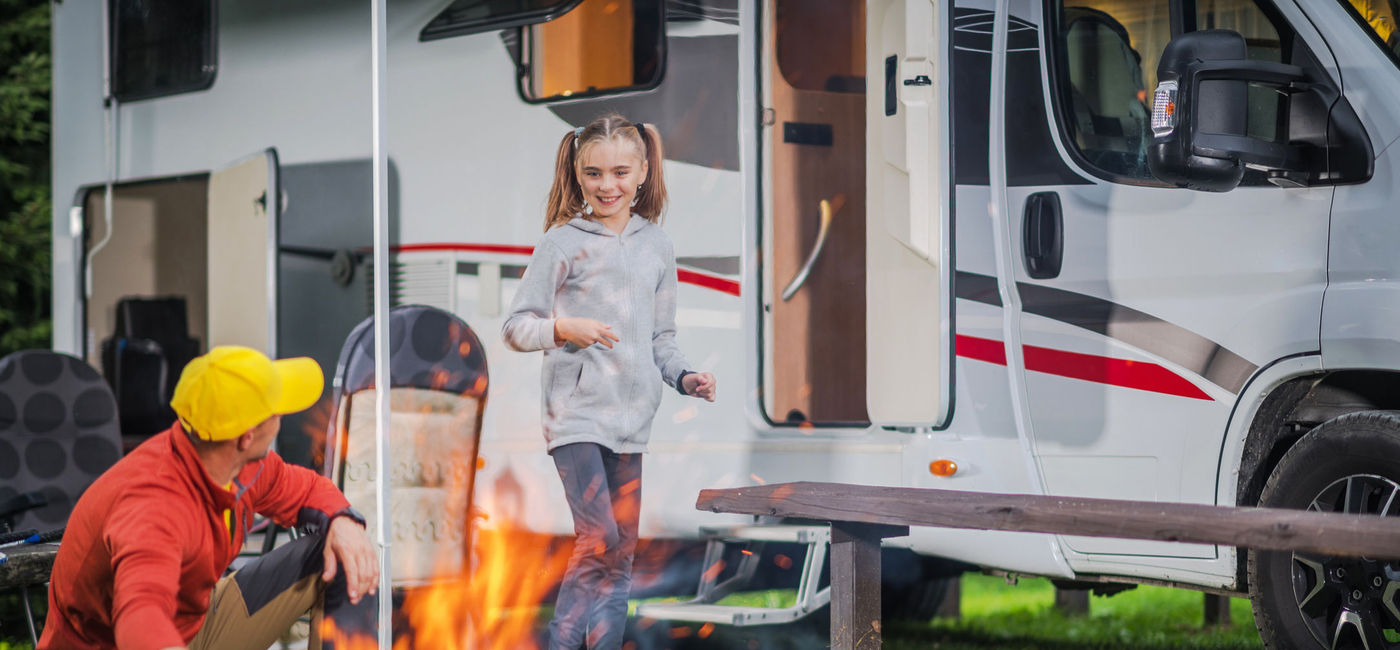 Image: Family RV road trip campsite. (Photo courtesy of iStock/Getty Images Plus/welcomia)